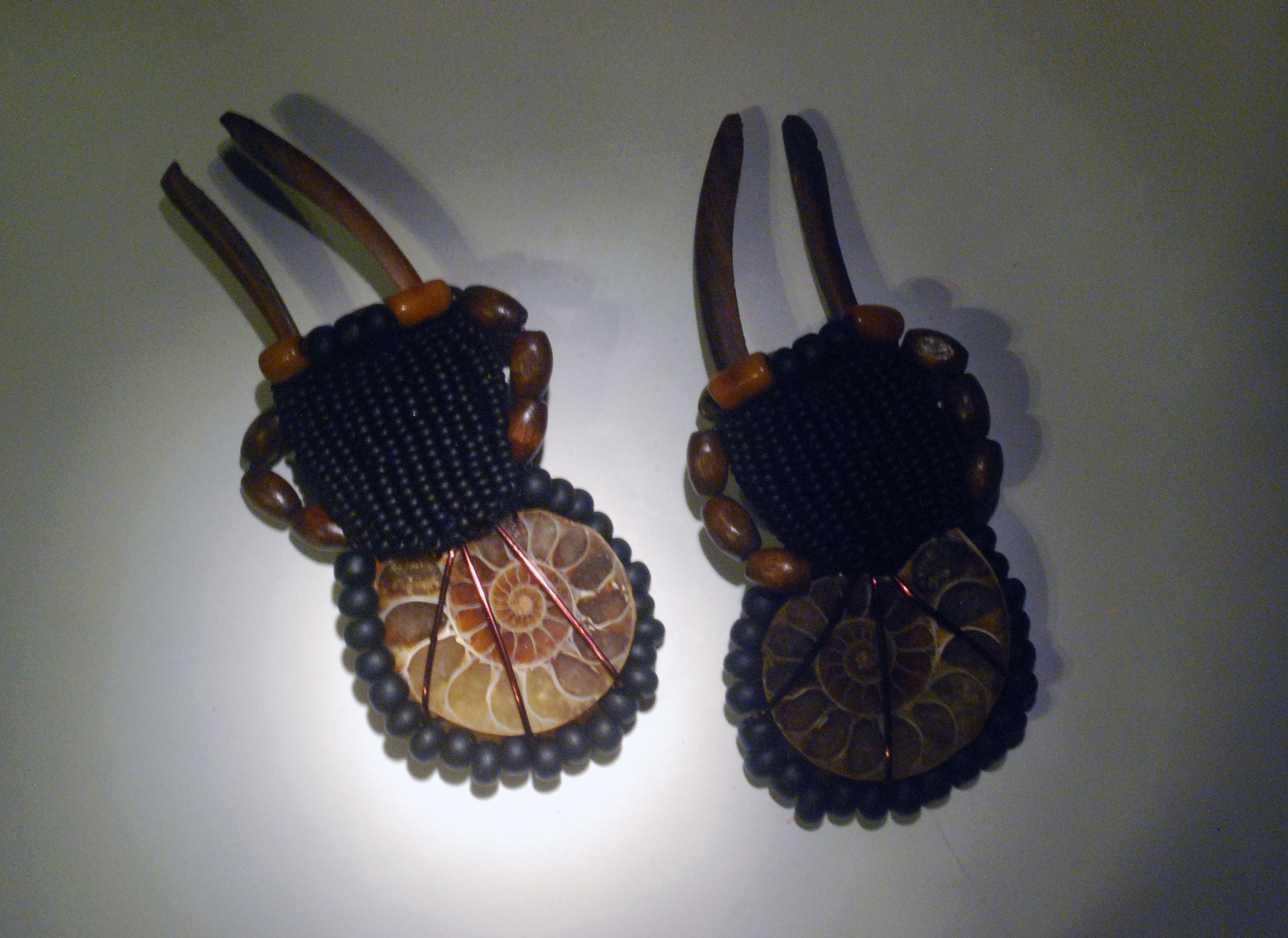 ammonite tribal style stick earrings