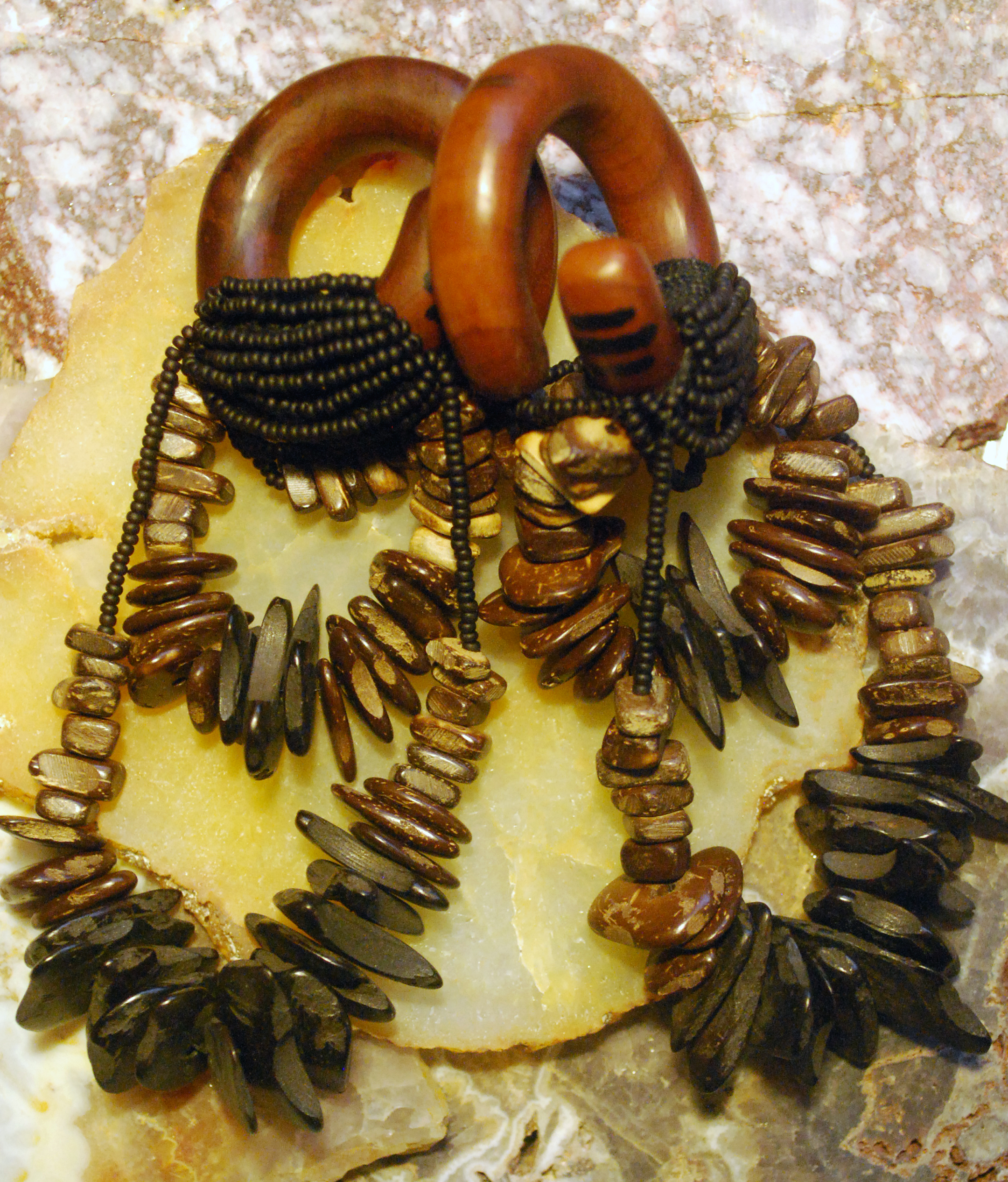 new set, these are for sale at laughing buddha in seattle. 7/16" saba wood with oak and nut dangling on silk wrapping.